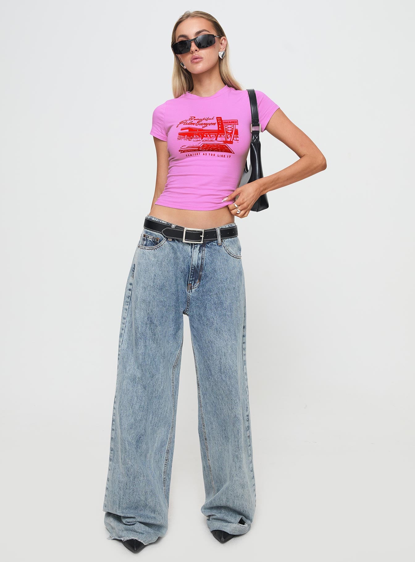 front view of model wearing Princess Polly Palm Canyon Tee Pink Short Sleeves Crew Neck 