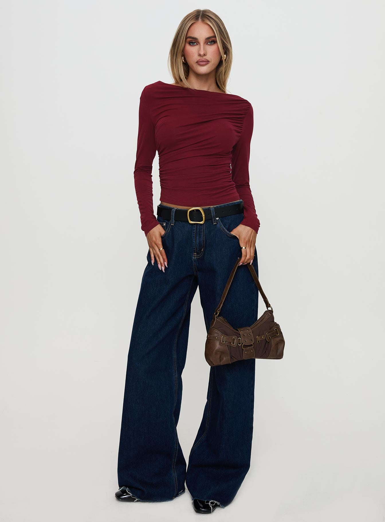 front view of model wearing Princess Polly Amberlyn Long Sleeve Ruched Top Burgundy Full Sleeves Boat Neck 