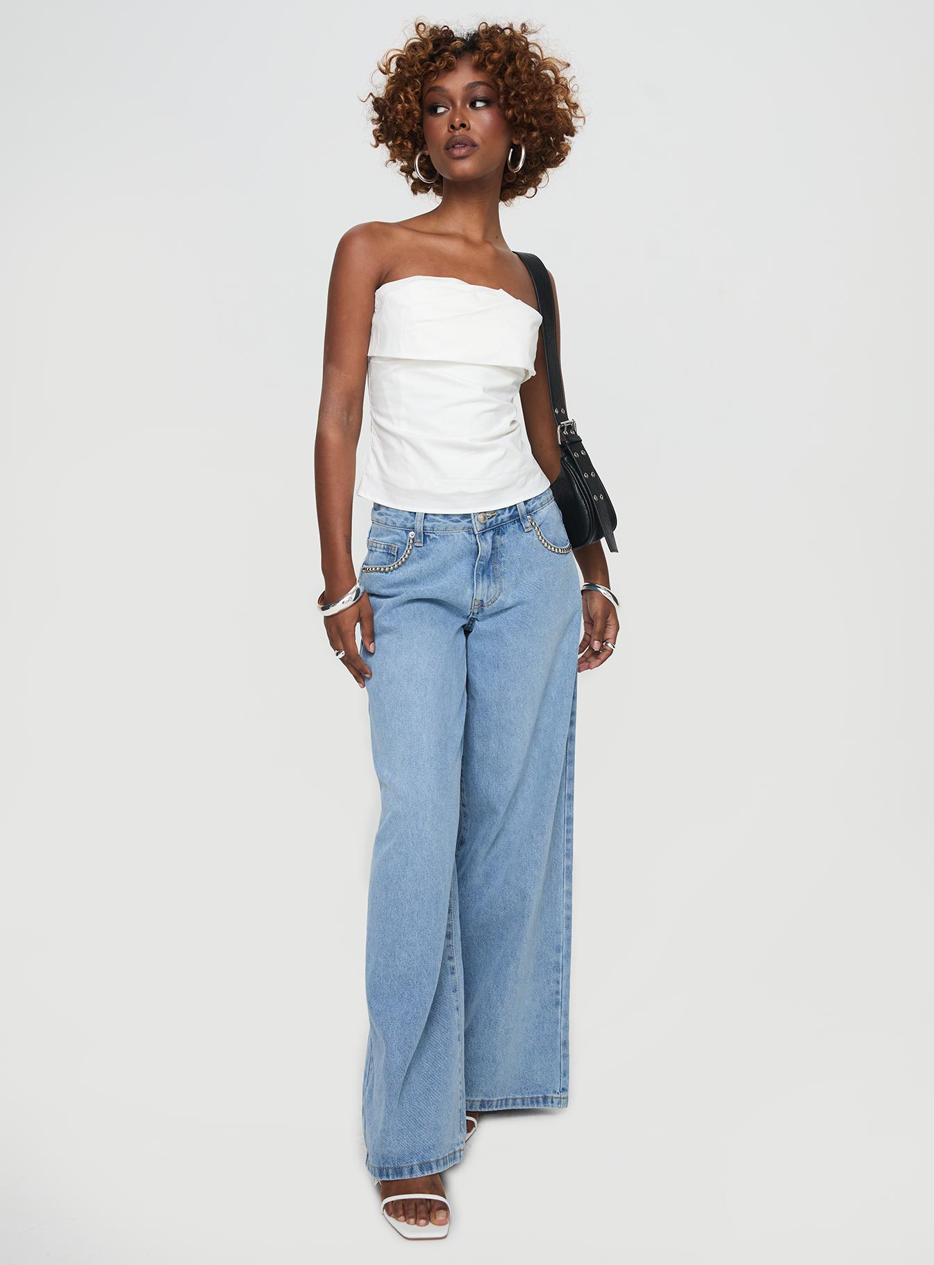 side view of model wearing Princess Polly Xandria Strapless Top White Sleeveless straight 