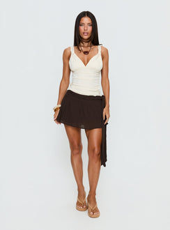   front view of model wearing Princess Polly Reviva Ruched Wrap Mini Skirt Chocolate Mini Skirts 