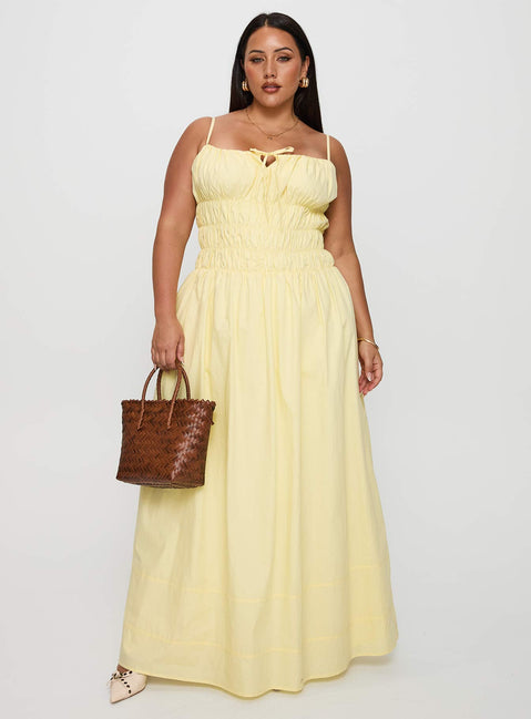 front view of model wearing Princess Polly Loralei Shirred Maxi Dress Yellow Curve Square Neck 