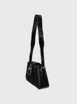Shoulder bag Faux leather, adjustable strap, silver-toned hardware, buckle detail, zip closure
