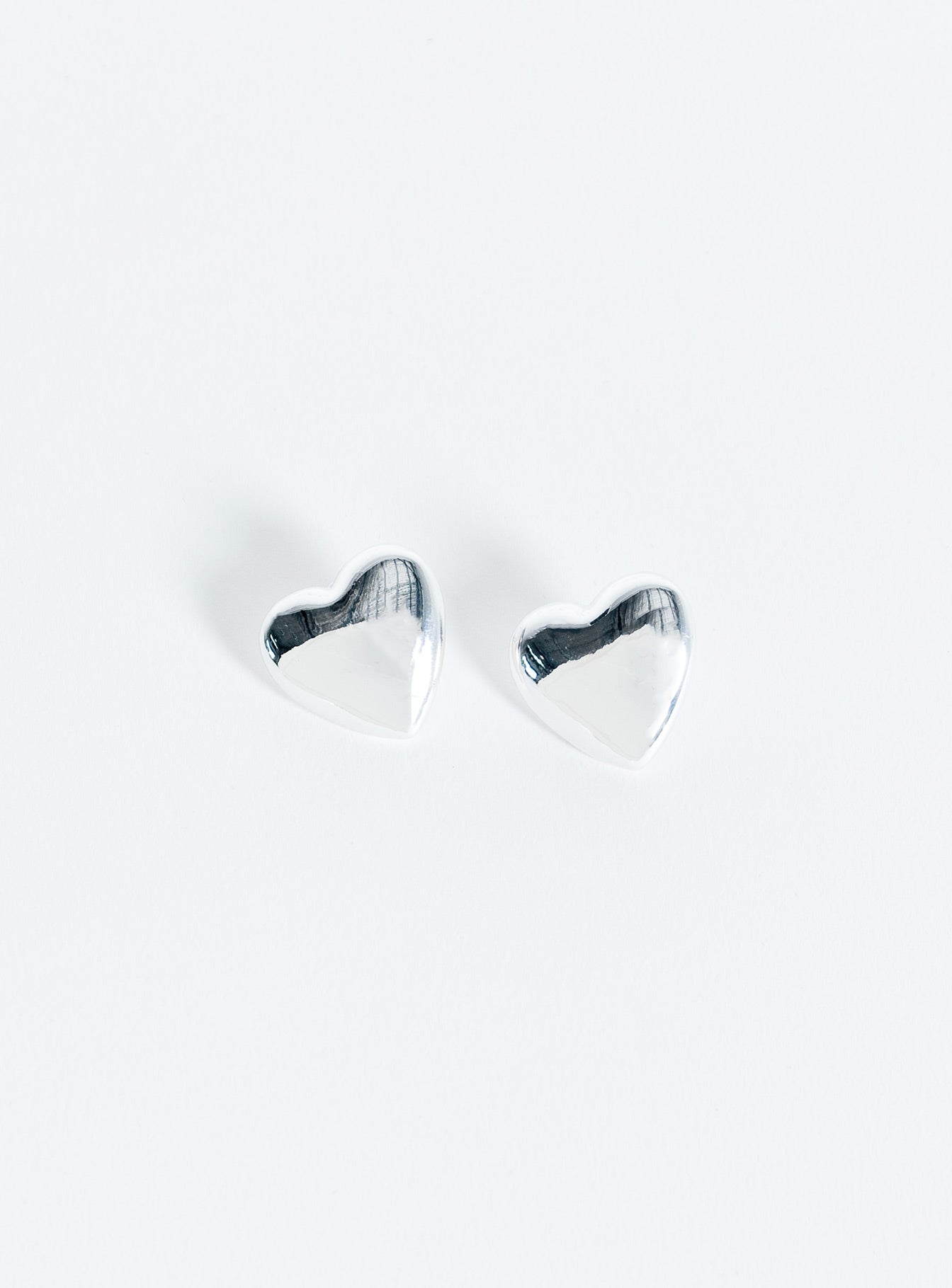 Silver-toned earrings Heart design, stud fastening