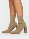Knit ankle boots Pull tab at back, pointed toe, block heel, padded footbed