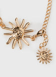 Gold-toned chain belt Layered design, sun pendants, lobster clasp fastening