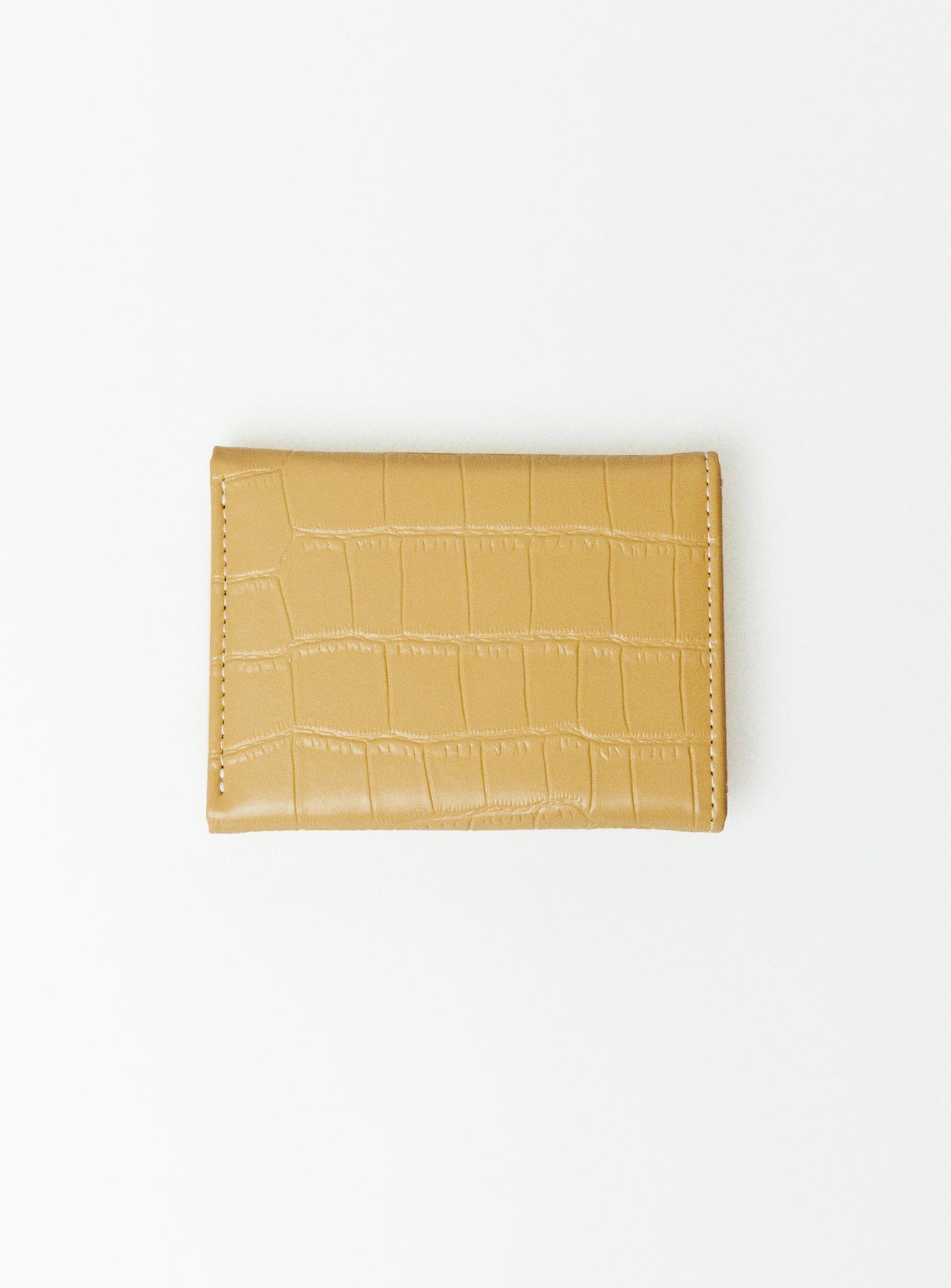 Cardholder Faux leather material  Croc print  Press button fastening  Multiple internal compartments 