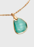 Gold-toned necklace Gemstone pendant, lobster clasp fastening