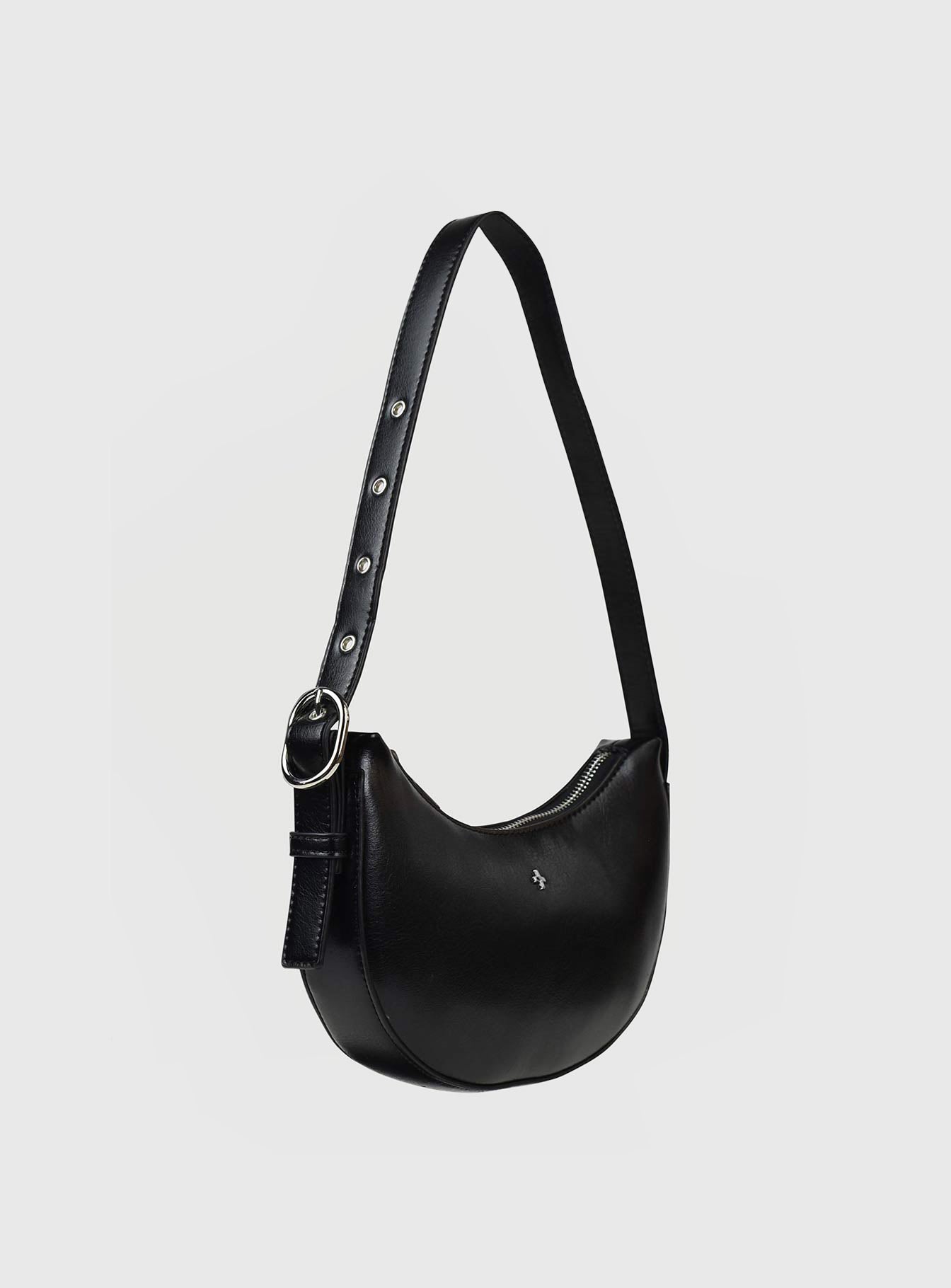 Shoulder bag  Adjustable shoulder strap with gold-toned detailing, gold-toned zip closure, branded logo at front, one main compartment with two internal pockets, round shape