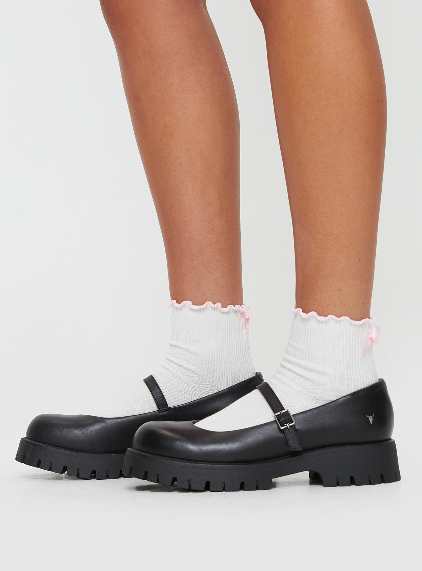 Mary jane flats Leather material, round toe, single upper strap, platform treaded sole, buckle fastening with silver-toned hardware