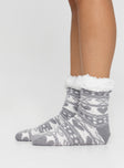 Winter socks, printed design Soft fleece lining, grip on bottoms Cold hand wash 
