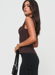 Front view of model wearing  front Princess Polly Sleeveless High Neck  Kyrie Longline Corset Top Brown