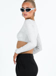 Long sleeve crop top V neckline Pinched detail at bust Good stretch Lined body