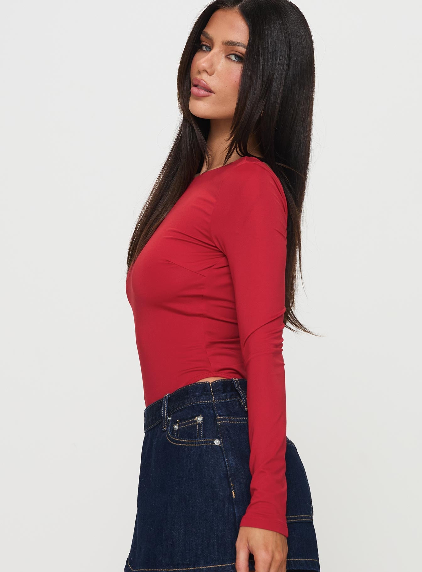 side view of model wearing Princess Polly Beresford Long Sleeve Bodysuit Wine Full Sleeves 