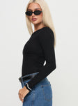 side view of model wearing Princess Polly Miyako Long Sleeve Bodysuit Black Full Sleeves Asymmetric Neckline 