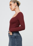 Bodysuit Slim fitting, ribbed material, wide square neck, high cut leg, cheeky style bottom Internal silicon strip along the shoulder, press clip fastening at base
