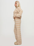 side view of model wearing Princess Polly Read Your Mind Knit Pant Cream Stripe High Waisted Pants 