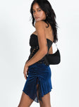 Mini skirt Sparkle material Asymmetric design Adjustable ruching at side