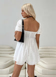 Romper Broderie anglaise material Square neckline  Elasticated puff sleeves  Inner silicone strip at bust  Relaxed through body  Shirred back  Invisible zip fastening at back 