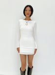 Long sleeve mini dress Textured material High neckline Low back with tie fastening Flared cuff Good stretch Fully lined 