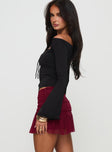   side view of model wearing Princess Polly Captain Mini Skirt Wine Mini Skirts 