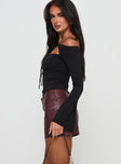   side view of model wearing Princess Polly Magee Faux Leather Mini Skirt Burgundy Mini Skirts 