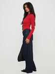 side view of model wearing Princess Polly Jankins Baggy Jeans Dark Blue Wash Mid Rise 