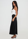   side view of model wearing Princess Polly Haley Maxi Skirt Black Maxi 