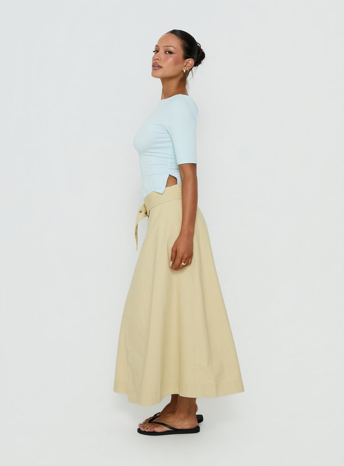 Featuring the True Visions Belted Maxi Skirt Sand in womens-skirts with maxi length side view of model wearing Princess Polly