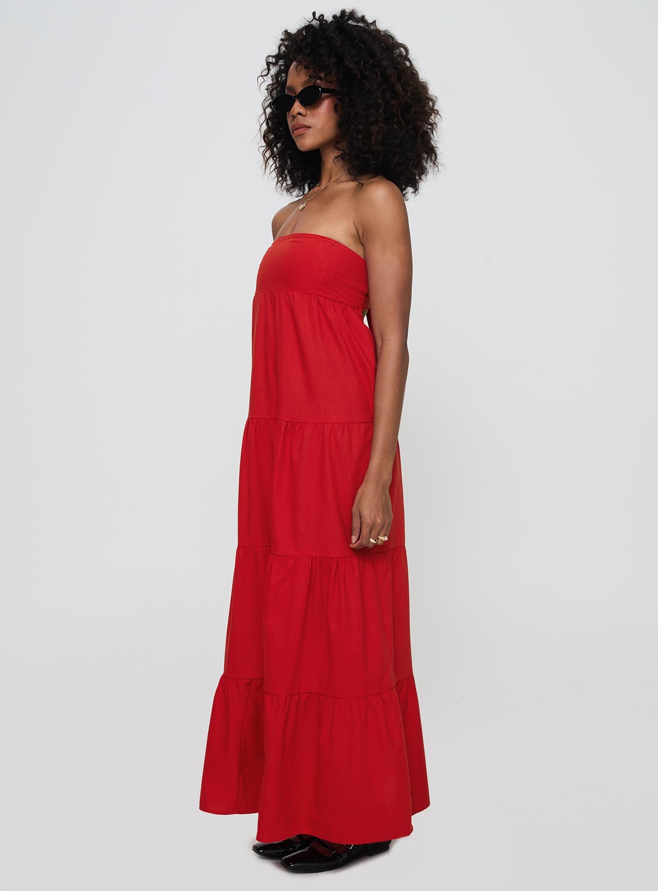 side view of model wearing Princess Polly Kazia Maxi Dress Red Straight Neck 