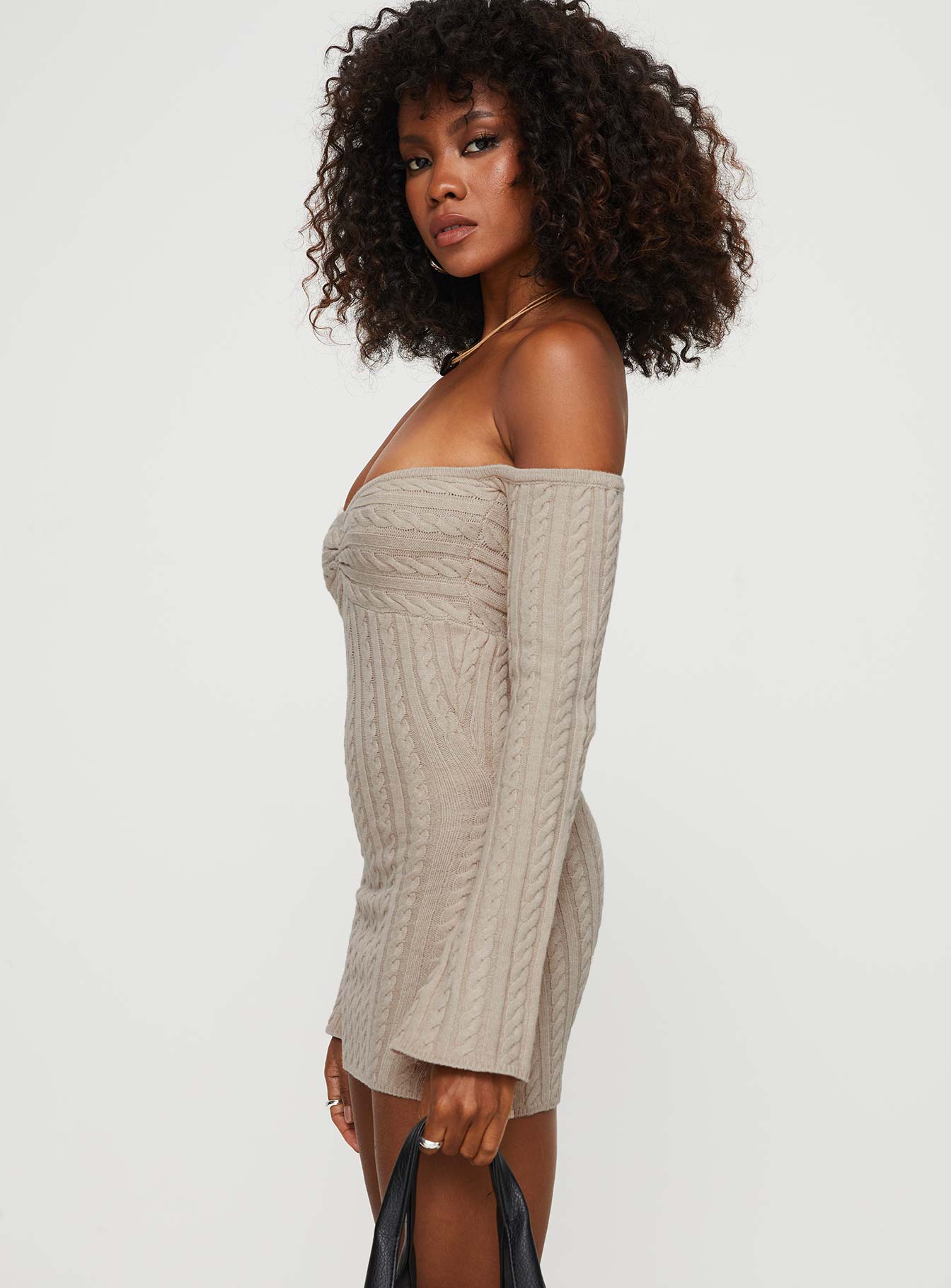 side view of model wearing Princess Polly Bayard Off The Shoulder Knit Mini Dress Beige Straight Neck 