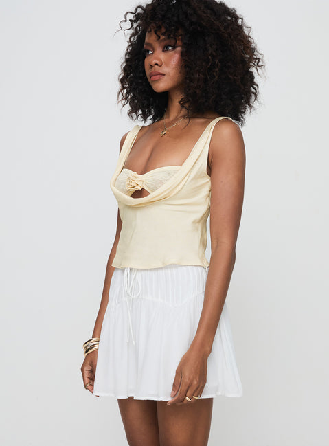   side view of model wearing Princess Polly Cherry On Top Mini Skirt White Mini Skirts 