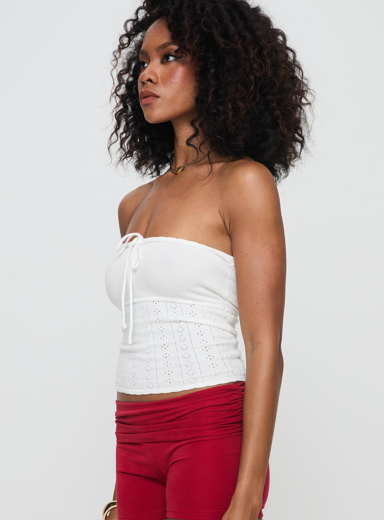 side view of model wearing Princess Polly Seona Strapless Top White Sleeveless straight 