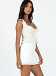   side view of model wearing Princess Polly Selby Mini Skirt White Tall Mini Skirts 