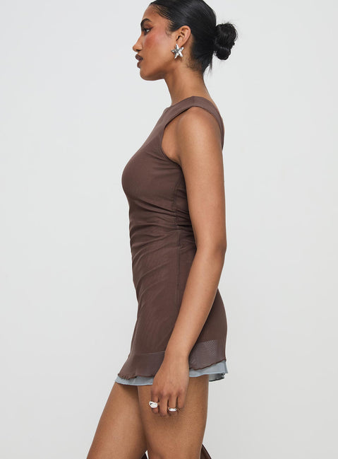 side view of model wearing Princess Polly Ren Mini Dress Brown/ Blue Boat Neck 