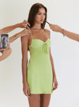 Green mini dress Ruched bust adjustable straps halter tie detail