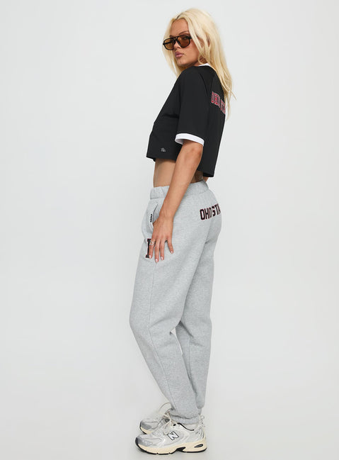 side view of model wearing Princess Polly Ohio State Basic Sweatpants Grey Mid Rise Pants 