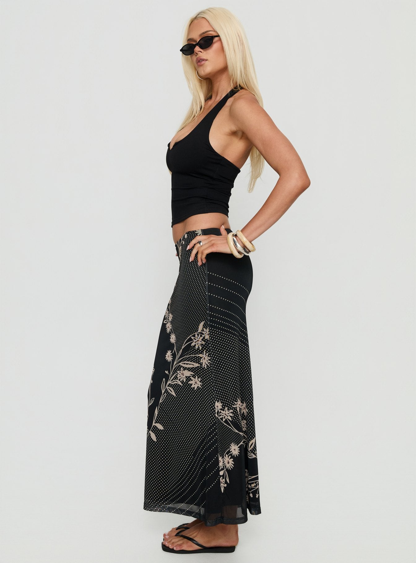   side view of model wearing Princess Polly Dreamers Midi Skirt Multi Floral Maxi Skirts 