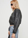 Faux Leather Jacket  Drop shoulder, ribbed collar, cuff & hem, twin hip pockets with clasp fastening  Zip fastening at front 