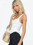 White corset top Sheer lace material Square neckline Hook and eye fastening at front Good stretch Mesh lining