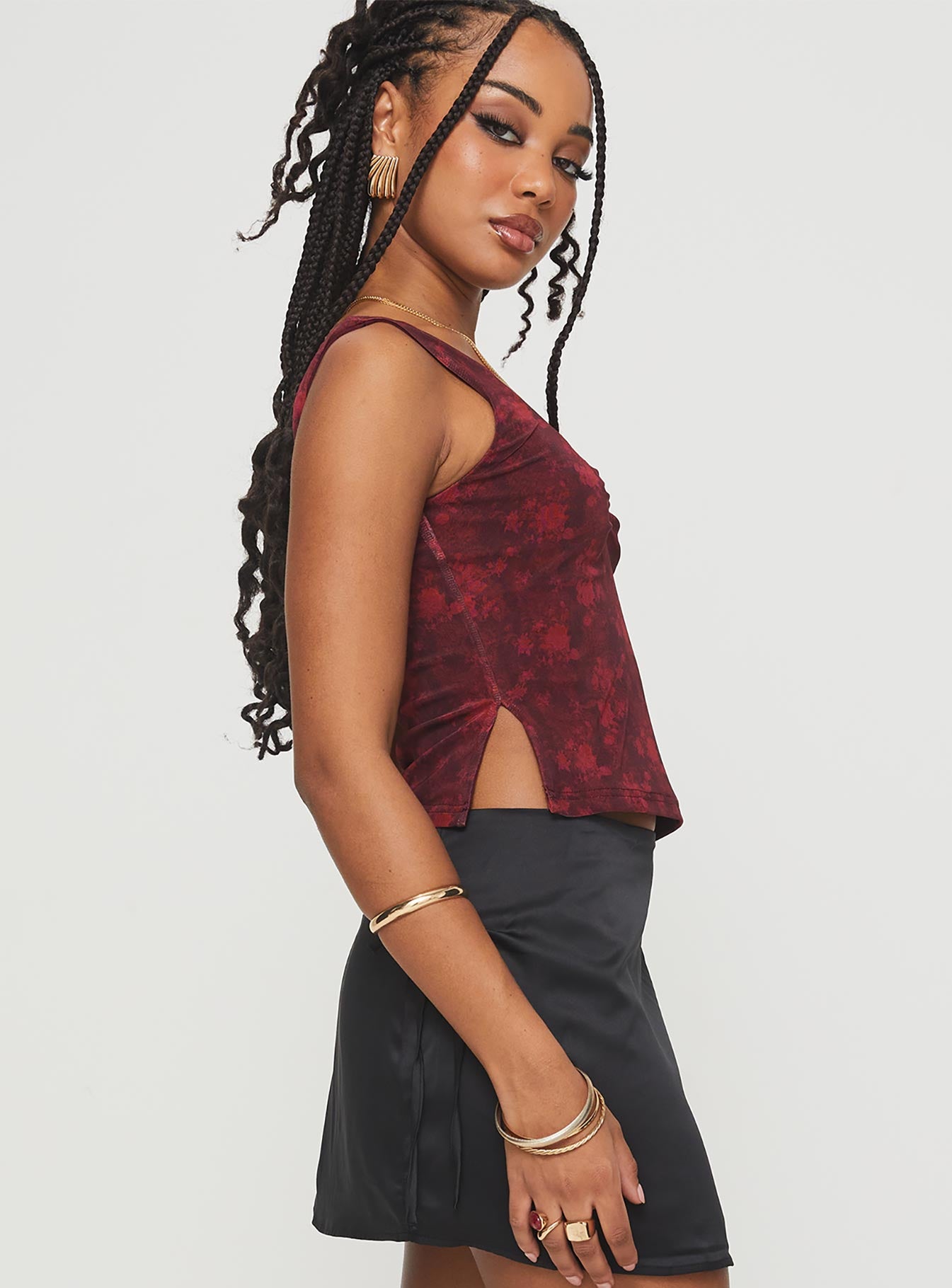 side view of model wearing Princess Polly Rehna Top Red Floral Sleeveless V-Neck 