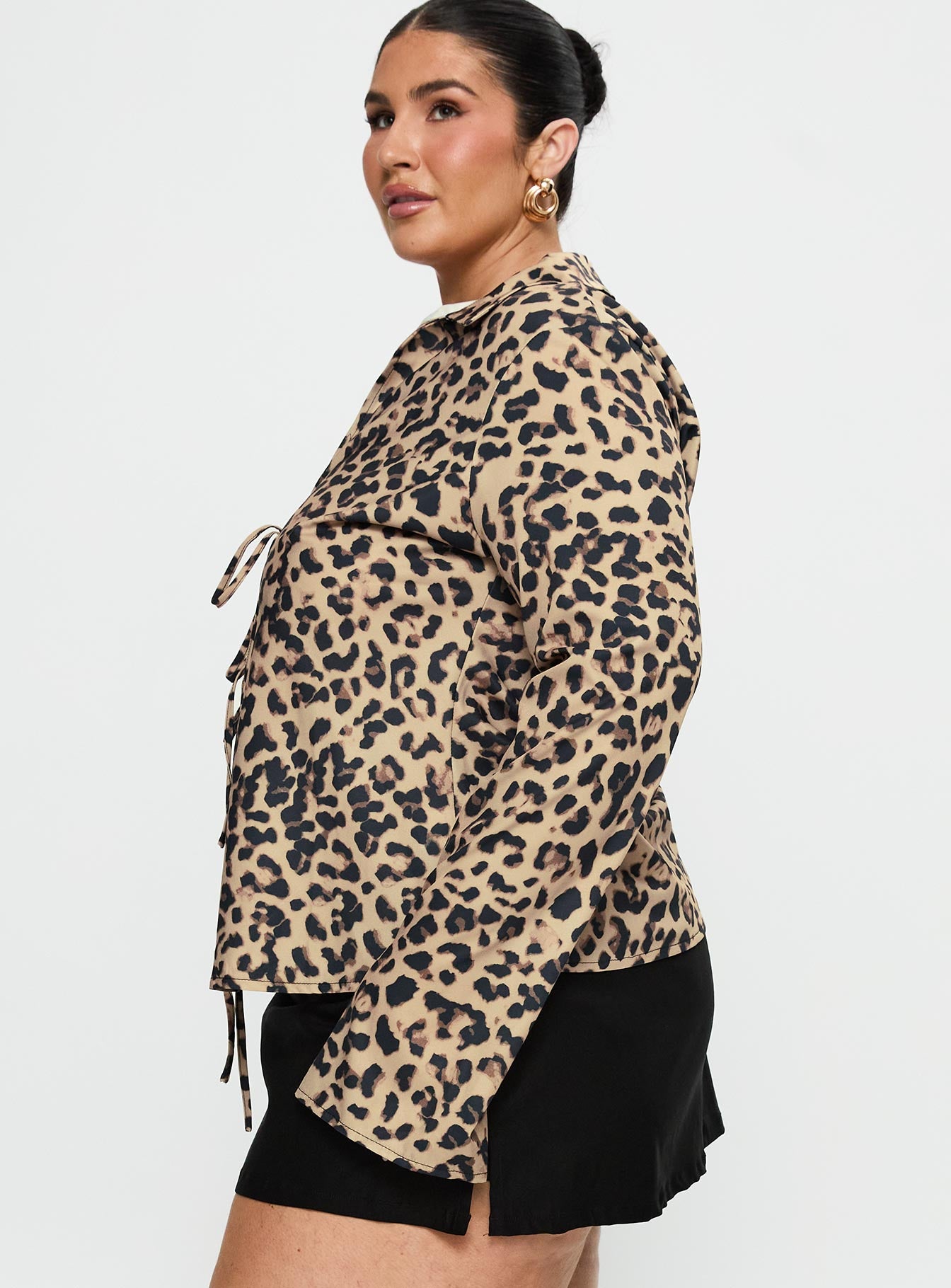 side view of model wearing Princess Polly Toriah Long Sleeve Tie Up Top Leopard Curve Full Sleeves V-Neck 