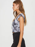 Mesh crop top, plaid print V-neckline, tie detail at bust, cap sleeve Good stretch, partially lined