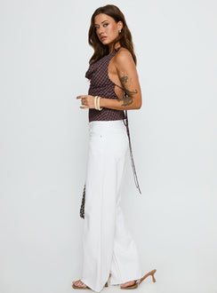 side view of model wearing Princess Polly Sabryna Low Rise Straight Leg Jeans White Low Rise Jeans 