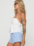 Crop top Halter strap with tie fastening, pleated bust, button detail down front, shirred back panel Non-stretch material, lined bust