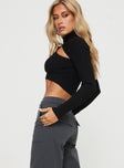 side view of model wearing Princess Polly Engler Long Sleeve Top Black Full Sleeves High Neck 