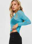 side view of model wearing Princess Polly Trivette Long Sleeve Top Blue Full Sleeves Crew Neck 