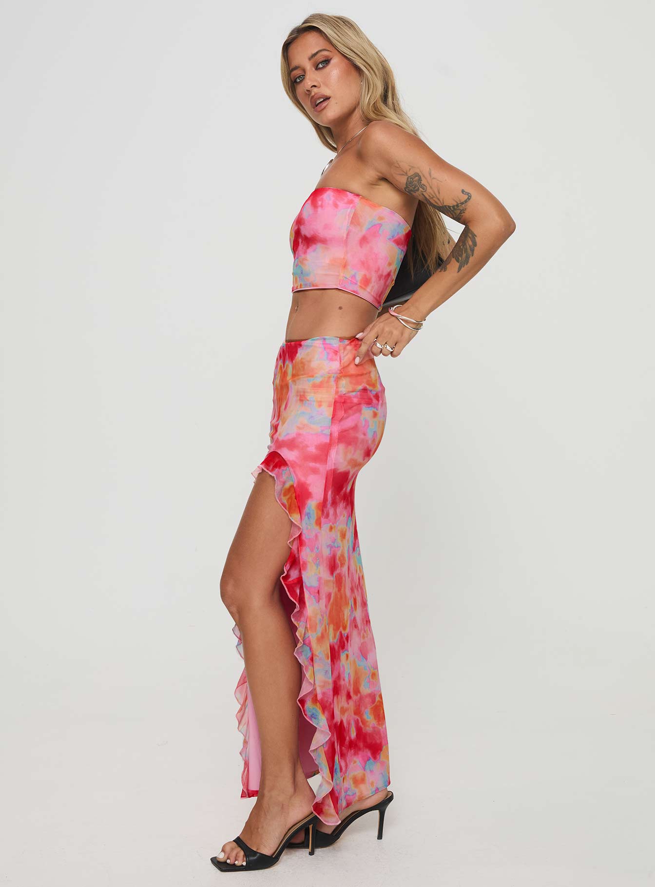 Matching set Mesh material, tie-dye print, strapless style, inner silicone strip at bust, elasticated waist, high split in hem, frill detail Good stretch, fully lined  Princess Polly Lower Impact 