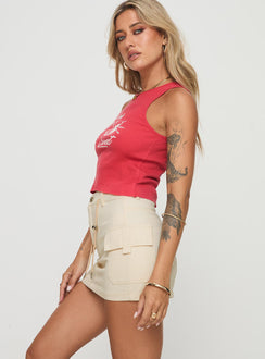   side view of model wearing Princess Polly Torres Cargo Mini Skirt Cream Mini Skirts 