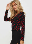 side view of model wearing Princess Polly Afia Long Sleeve Top Black / Red Full Sleeves Plunger 