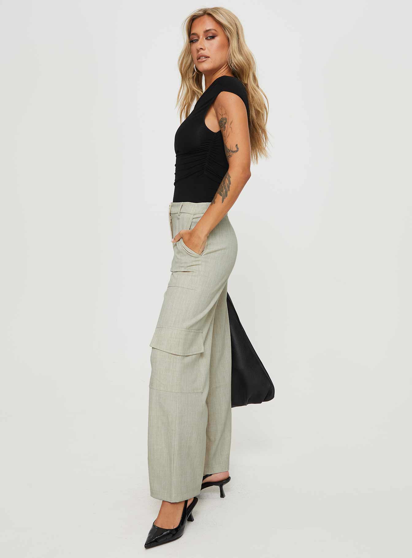 side view of model wearing Princess Polly Stacks Cargo Pant Beige Mid Rise 